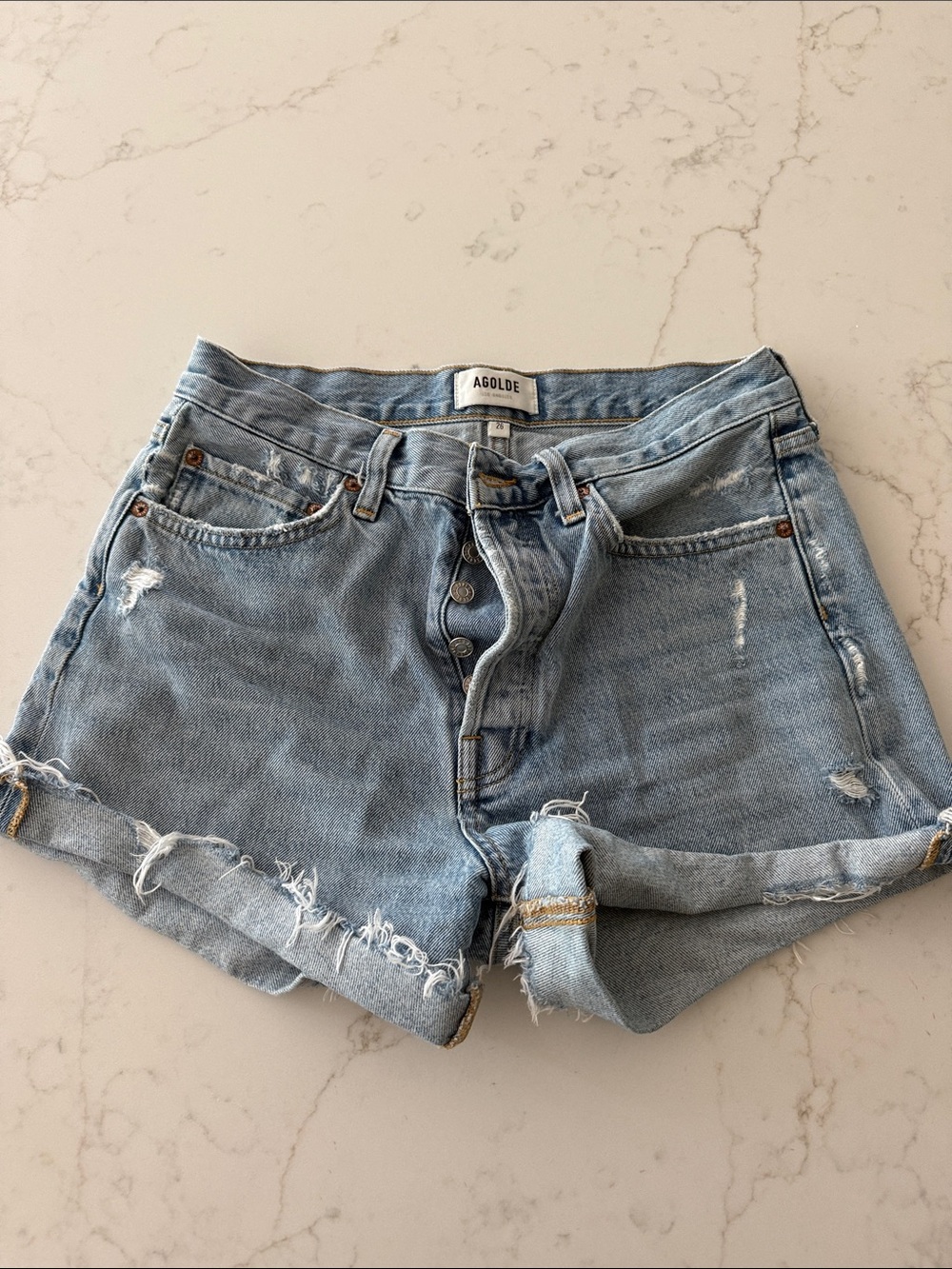 Agolde Light Wash Distressed Denim Cutoff Shorts